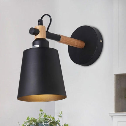 Versatile Wall Lamp for Home Lighting in Living Spaces — black iron and wood wall sconce for living room or bedside reading