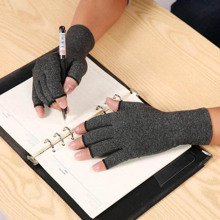 Arthritis Half-Finger Compression Gloves For Everyday Use Size M worn while writing in planner