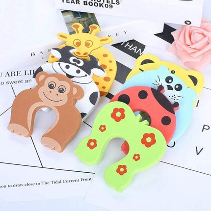Baby Finger Safety Guard Door Stopper For Easy Pinch Prevention - colorful animal foam door stoppers (monkey, giraffe, cow, ladybug) for baby safety