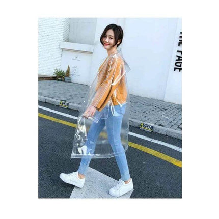 Transparent EVA Raincoat for Everyday Outdoor Protection - clear waterproof EVA raincoat worn by woman over casual outfit, ideal for commuting and light rain