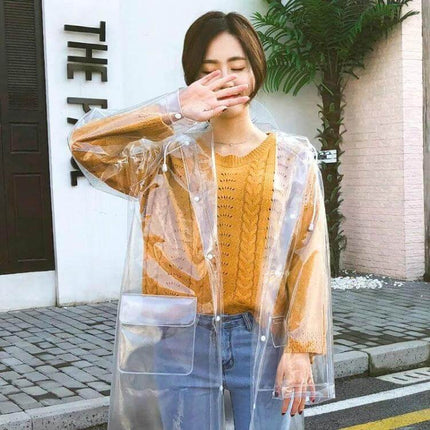 Transparent EVA Raincoat for Everyday Outdoor Protection on woman over sweater and jeans, clear waterproof EVA layer shedding rain