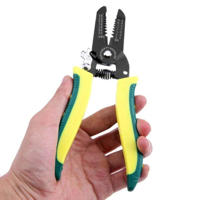 Cable Stripper Tool Portable For Everyday Wiring Tasks in hand, compact 8×3×2 cm wire stripper with ergonomic yellow-green grips