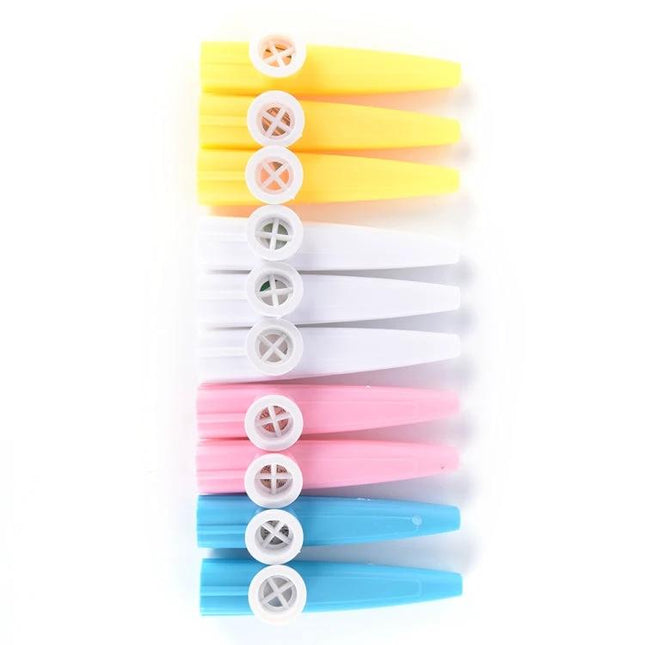 Colorful Plastic Kazoo for Children's Daily Music Fun - row of yellow white pink blue plastic kazoos for kids music play