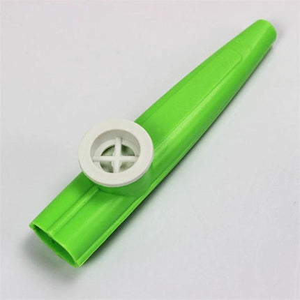 Colorful Plastic Kazoo for Children's Daily Music Fun - bright green plastic kazoo on white background, simple kids musical toy for play and learning