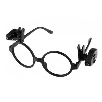 Clip-On Light for Glasses During Evening Reading Tasks - black clip-on LED lights attached to round eyeglass frames for focused bedside reading
