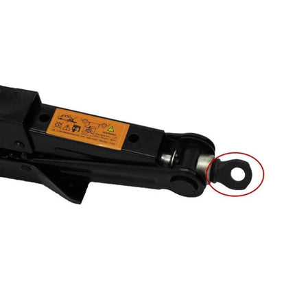 Foldable Hand Jack for Roadside Tire Changes in Emergencies — close-up of collapsed black scissor jack arm with warning label and pivot ring