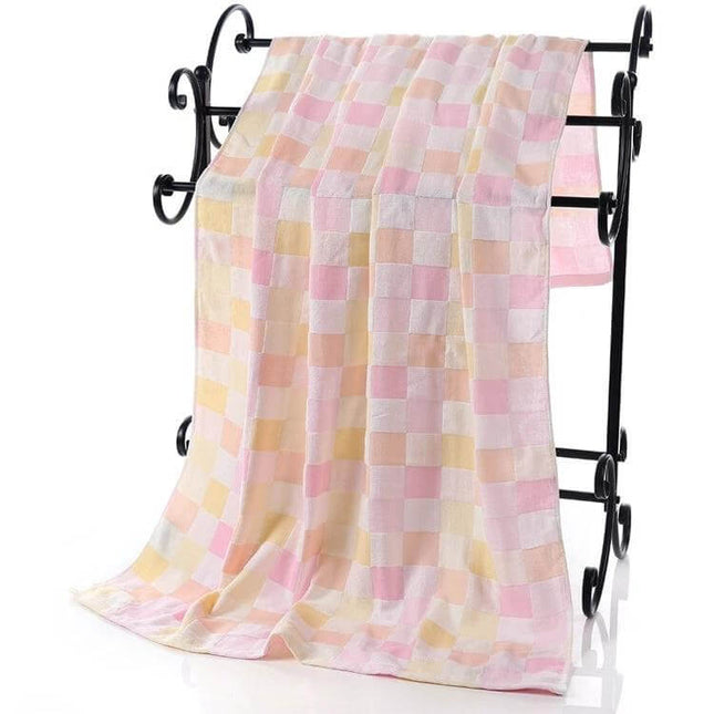 Alt Tag: Double Gauze Cotton Bath Towel For Everyday Use 70x140 cm pastel plaid 100% cotton lightweight 200g breathable towel on black towel rail