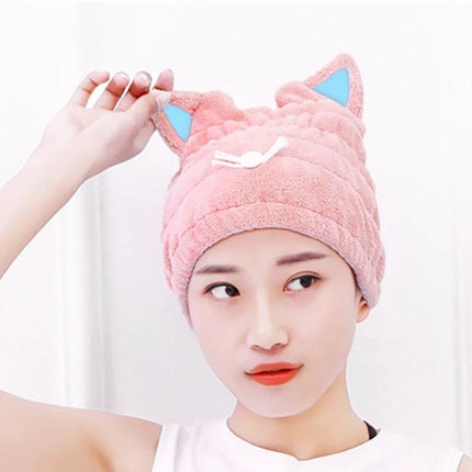 Cat Ear Shower Cap for Everyday Hair Drying at Home in pink coral fleece with cat ears, model wearing cap to keep hair dry