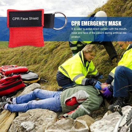 Compact CPR Face Shield Mask with Key Ring for Emergencies shown with rescuers performing CPR at roadside
