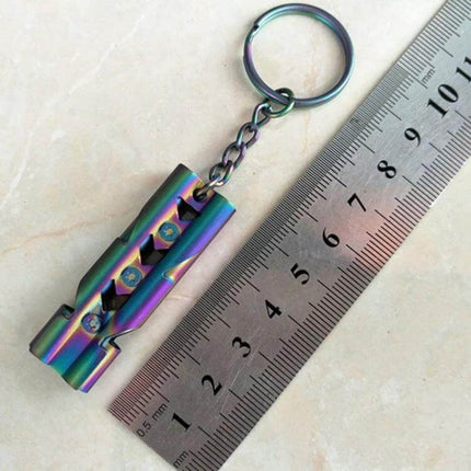 Outdoor Survival Whistle With Key Ring Stainless Steel - compact rainbow 440 stainless steel whistle with key ring shown next to ruler