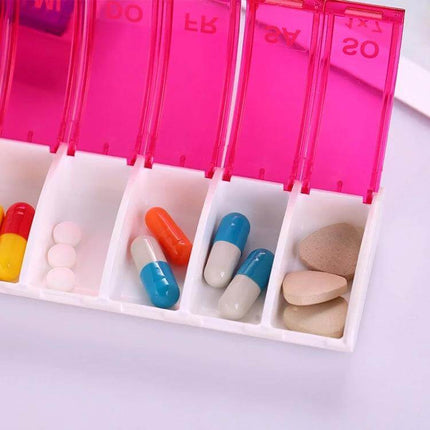 Portable Seven-Part Mini Storage Pill Box For Weekly Meds - translucent pink ABS single-row seven-compartment weekly pill organizer