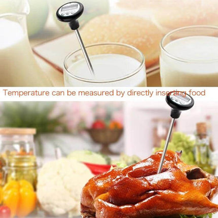 Portable Digital Meat Thermometer for Cooking and Barbecue inserted into roast chicken and into glass to show use and display