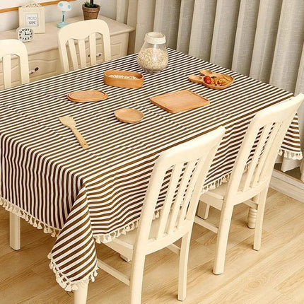 Linen Tablecloth 140x180cm For Weddings And Dinners striped brown linen tablecloth on dining table with wooden plates