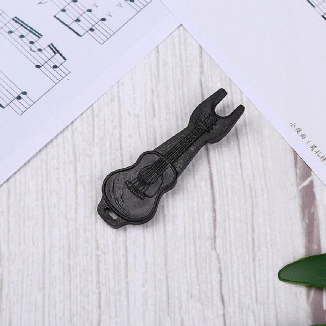 Guitar String Tool for Easy Home Practice Changes – compact guitar-shaped string winder and remover for quick at-home string swaps
