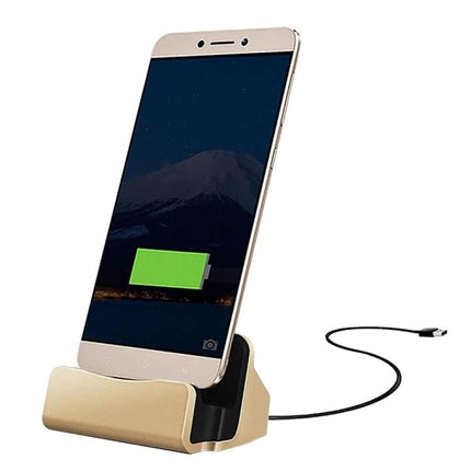 Desk Stand for Easy Smartphone Charging and Viewing showing phone charging hands-free on a gold desktop dock with USB cable