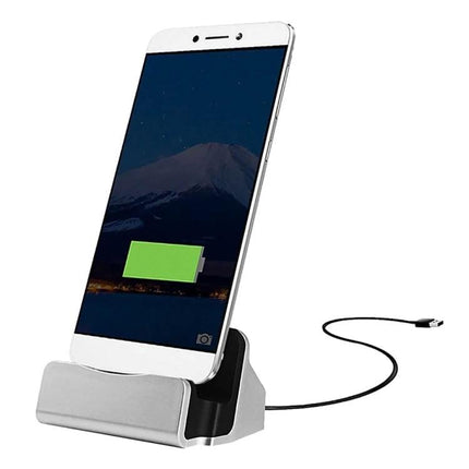 Desk Stand for Easy Smartphone Charging and Viewing showing phone charging hands-free on a tidy desk with USB cable