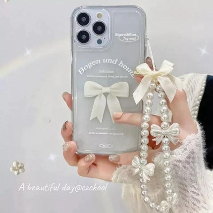 Versatile Handmade Butterfly Pearl Resin Phone Chain Accessory shown in clear phone case with pearl strap and bows