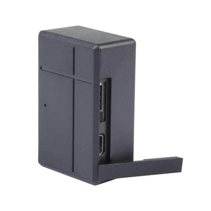 Compact Magnetic GPS Tracker for Everyday Item Tracking - compact black magnetic GPS tracker showing USB port and removable cover for keys, bags, vehicles