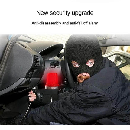 Compact GPS Tracker for Cars and Trucks with Easy Monitoring showing anti-tamper alarm deterring car thief in dashboard