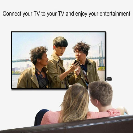 MiraScreen G4 Wireless HDMI Dongle for TV Screen Mirroring showing couple casting a movie from a phone to a large TV for family viewing