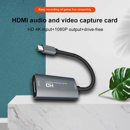 Portable HDMI to USB-C Video and Audio Capture Device for Recording shown with HDMI input and USB-C cable for capturing gameplay and streaming