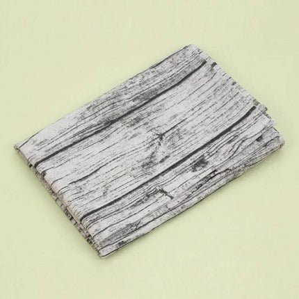 Tablecloth For Dining Tables 100X140 Cm Simple Everyday Use gray wood-grain cotton-linen blend oilproof surface folded on neutral background