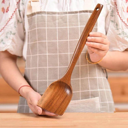 Teak Wood Kitchen Utensil Set Nonstick Pot Shovel And Spoons - polished teak wooden pot shovel held by person, safe for nonstick cookware