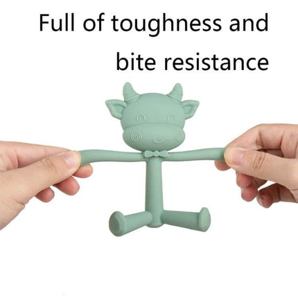 Three-Dimensional Cartoon Silicone Baby Teether for Soothing Gums - green cow-shaped silicone teether shown stretched to demonstrate bite resistance