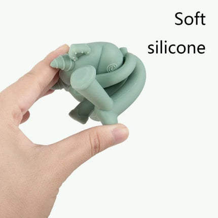 Three-Dimensional Cartoon Silicone Baby Teether for Soothing Gums - soft green silicone teether held in hand, multi-form bite points for babies 3+ months