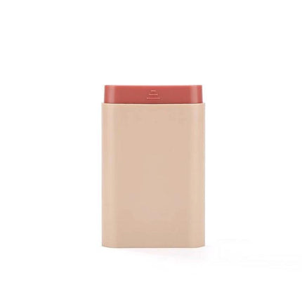 Three-Piece Portable Pill Box For Daily Use Ideal For Home Or Travel - compact beige ABS plastic pill organizer with removable divider and pull-out lid