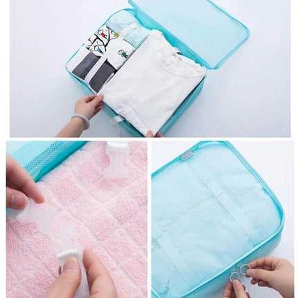 Travel Storage Bag Set For Clothes Organization 10 In 1 neatly packed turquoise packing cube with buckle system securing folded shirts and accessories