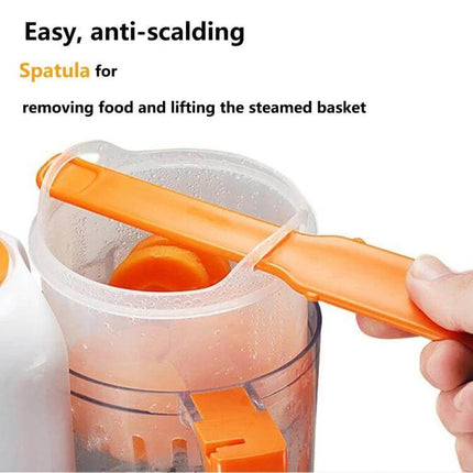 Two-Pack Mini Baby Food Maker, Electric Steamer and Stirrer showing orange anti-scalding spatula lifting steamed basket from one unit