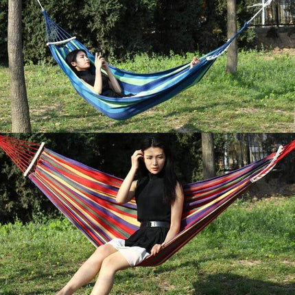 Two-Person Canvas Hammock With Wooden Sticks, 190x150cm, Blue - outdoor backyard hammock hung between trees with person lounging