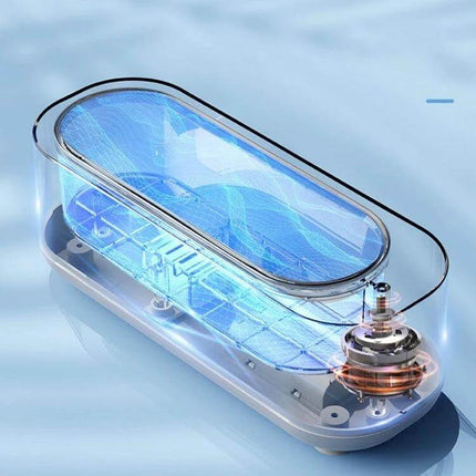 Ultrasonic Cleaner for Jewelry and Glasses, Rechargeable — compact transparent ultrasonic jewelry and glasses cleaner showing internal cavitation mechanism