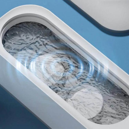 Ultrasonic Cleaner for Jewelry and Glasses, Rechargeable in-use showing 360-degree cavitation cleaning of jewelry and glasses