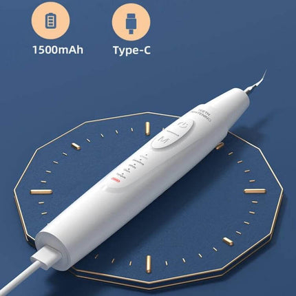 Ultrasonic Electric Scaler Portable For Home Dental Cleaning white handheld device with Type‑C charging and 1500mAh battery on blue background