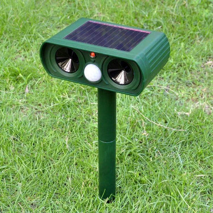 Ultrasonic Solar-Powered Animal Repeller, 2-Pack for Gardens staked solar PIR sensor deterrent in green housing on lawn