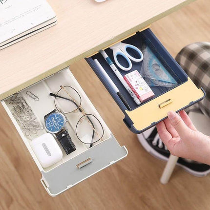 Under Desk Drawer Storage Box With Pull Out Pen Storage storing glasses, watch, scissors and pens in hidden slide-out trays under desk