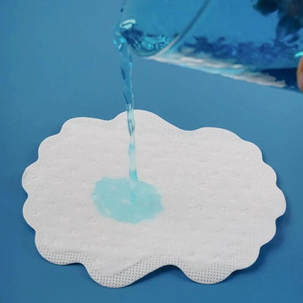 Underarm Sweat Absorbing Stickers Invisible For All Day Comfort - white absorbent underarm pad showing liquid absorption demonstration
