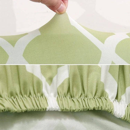 Universal Stretch Chair Cover For Everyday Dining Anti Fouling green patterned stretch fabric close-up showing elastic hem and stretchy knit