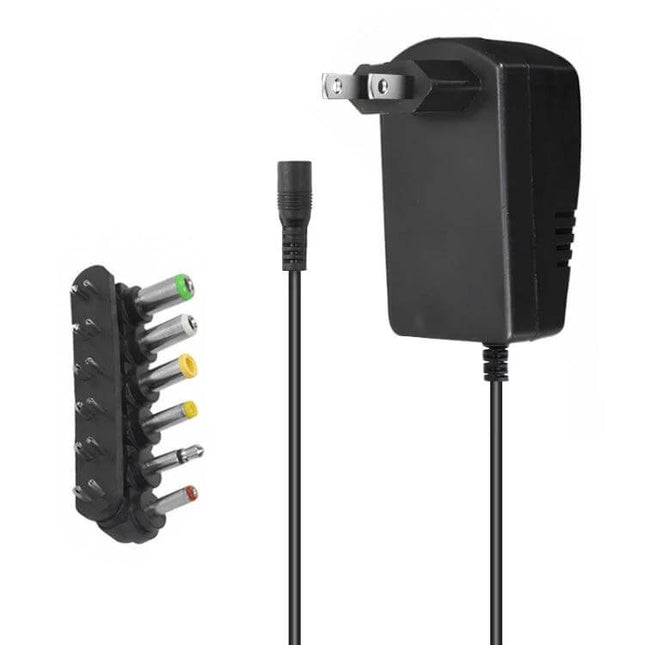 Universal Power Adapter With Seven Plugs For Home Electronics - black multi-voltage DC adapter with seven interchangeable tips