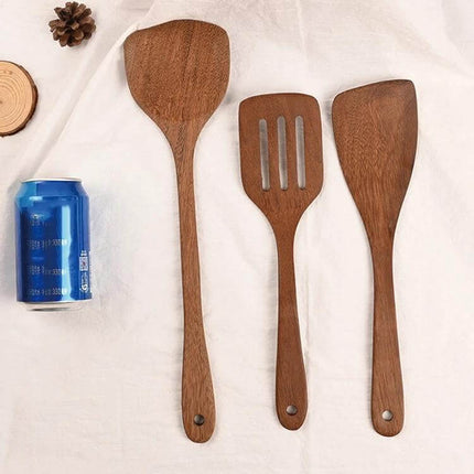 Unpainted Wooden Spatula Set, Long-Handle Utensils — three natural wooden kitchen spatulas with perforated middle spatula, long handles, chicken wing finish