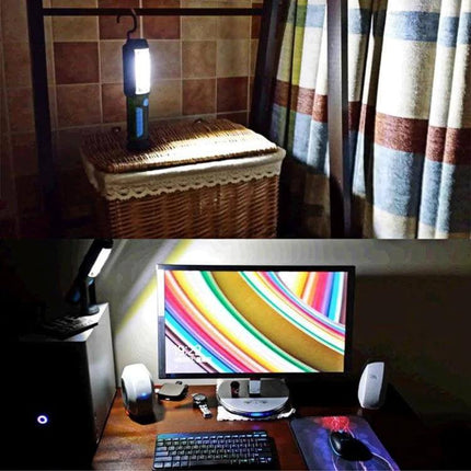 USB Charging Emergency Work Light With Magnetic Base hanging by hook over wicker chest illuminating desk setup, magnetic base on metal surface