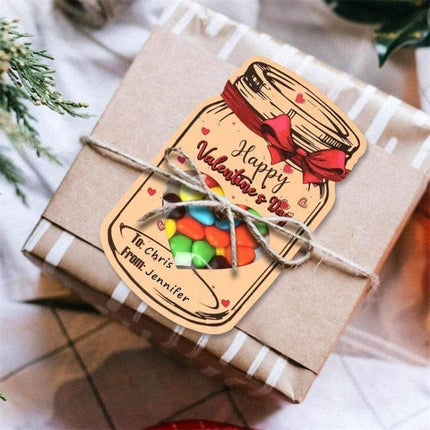Valentine Bottle Shape Greeting Cards For Kids Party Favors showing drift bottle card with hollow heart window filled with candies tied on gift box