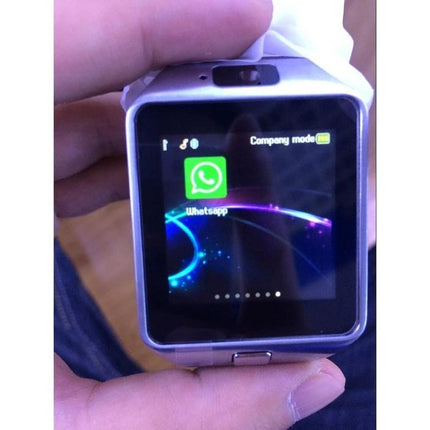 Smart Watch for Tracking Daily Activities and Staying Connected – silver smartwatch showing WhatsApp and activity screen while being held