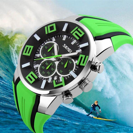SKMEI Multifunctional Sports Wristwatch for Everyday Water Activities – green and black chronograph watch with silicone band shown by ocean waves