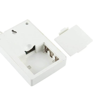 Teng Le Colorful Wired Door Chime for Home and Office Use white battery compartment open showing springs and cover