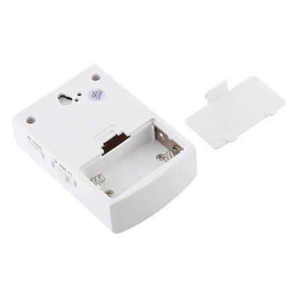 VOYE Wireless Doorbell with 38 Polyphony Sounds for Home Entry white receiver unit with open battery compartment and removable cover