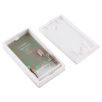 Voyage Wireless Doorbell for Easy Home Installation with Music Tones - open white receiver showing battery compartment and circuit board