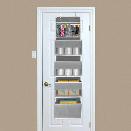 Wall-Mounted Fabric Storage Bag For Wardrobe Doors Gray 4-Grids hanging on white door organizing toiletries, baby items, shoes and accessories